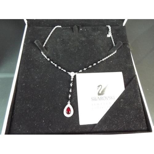 172 - Boxed and unused Swarovski crystal set necklace. Velvet lined presentation case with booklet.