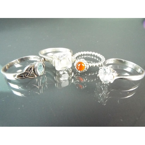 174 - Four large Stone set, sterling silver rings.