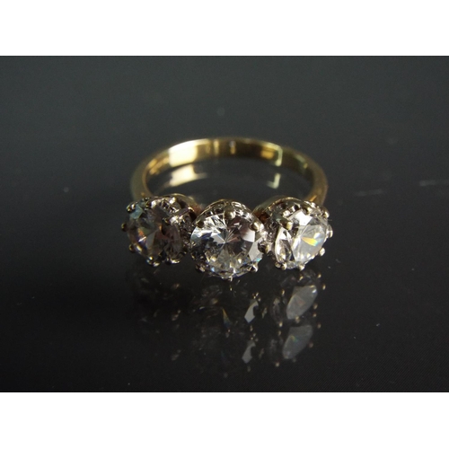 176 - 9ct Yellow Gold ring set with three large Cubic Zircona's. Finger size 'Q5'   4.5g