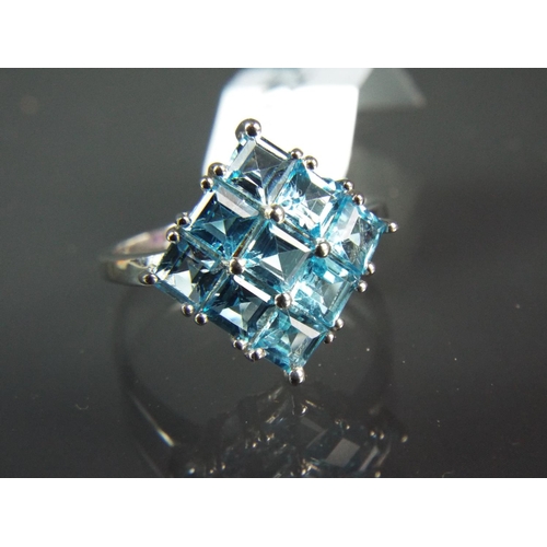 187 - Sterling Silver ring set with over 3cts of  Brazillian Topaz in a Cluster pattern. With COA. Finger ... 