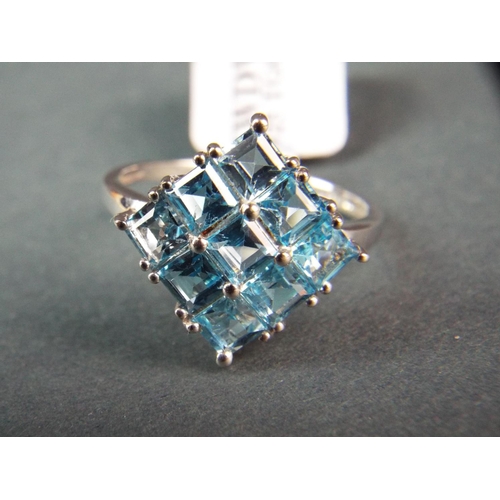 187 - Sterling Silver ring set with over 3cts of  Brazillian Topaz in a Cluster pattern. With COA. Finger ... 