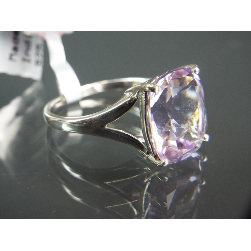 197 - Sterling silver ring set with large square solitarie Amethyst.  With COA.  Finger size 'T'