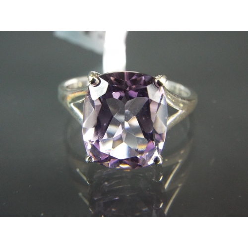 197 - Sterling silver ring set with large square solitarie Amethyst.  With COA.  Finger size 'T'