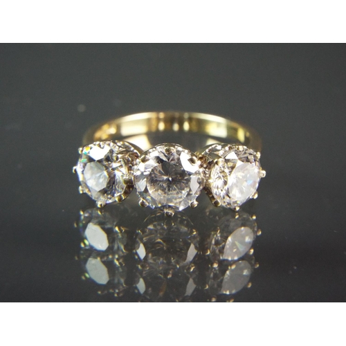 208 - 9ct Yellow gold ring set with three large Cubic Zircona's Finger size 'Q5'  4.5g