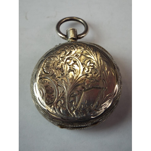 223 - Ladies continental pocket watch with enamelled dial and scrolled case. Non runner, spares/repairs