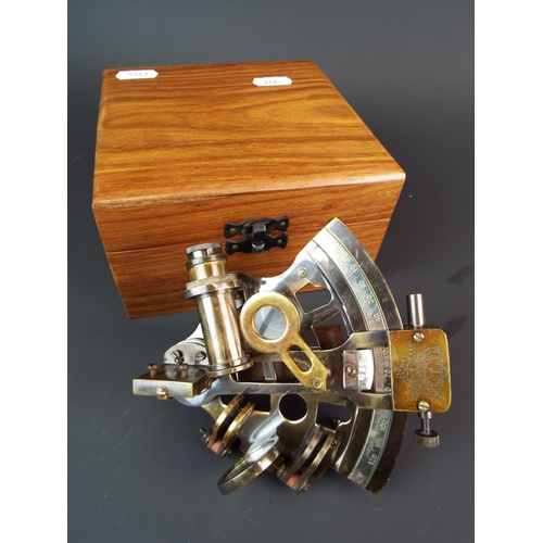 242 - Reproduction Sextant in a wooden case by Kelvin Hughes, London.