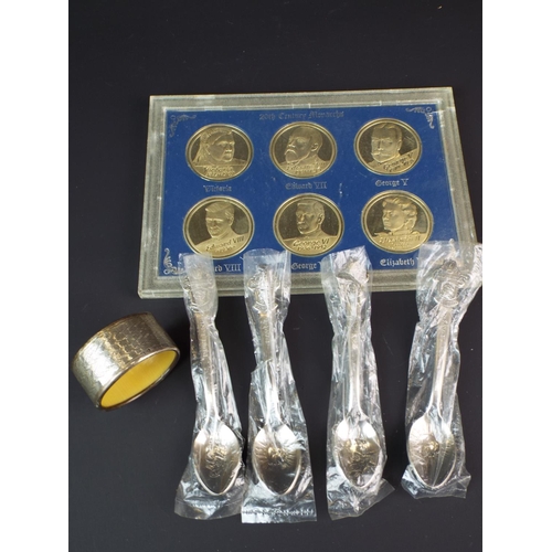 244 - Carded coin set showing six British Monarchs plus white metal spoons marked 'Rolex' along with silve... 