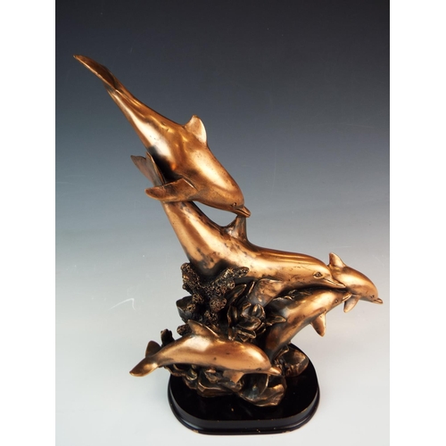 265 - Large bronze effect Spelter sculpture of a pod of Dolphins. Raised on wooden plinth, measures 13 inc... 