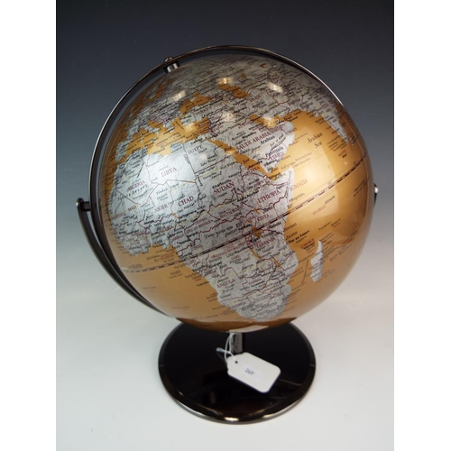 269 - Metal gold and silver coloured globe with three axis cradle. 13 inches tall.