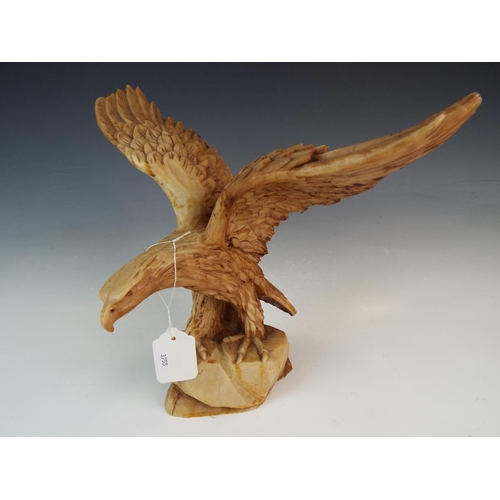 270 - Large and heavy resin sculpture of a Golden Eagle. 14 inch Wingspan.