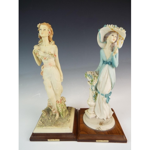 273 - Two large Italian made resin sculptures of fashionable ladies. (one with repaired hat)