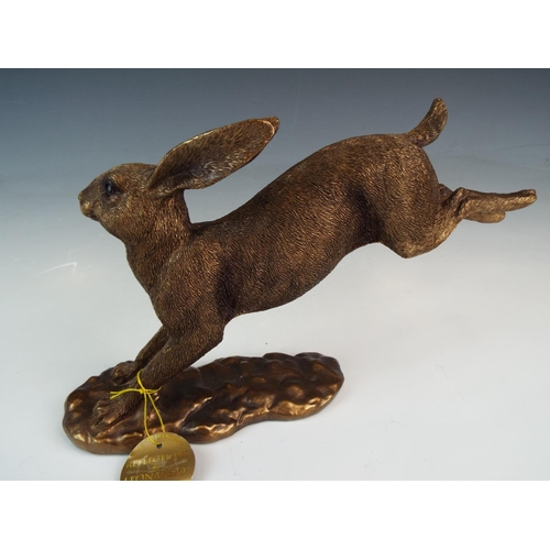 284 - Large Bronze effect resin sculpture of a Hare from the Leonardo 'Reflections' range. 13 inches long.