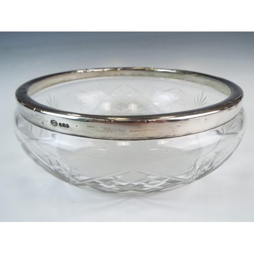 294 - Cut glass nut dish with London hallmarked rim. 8 inches in diameter