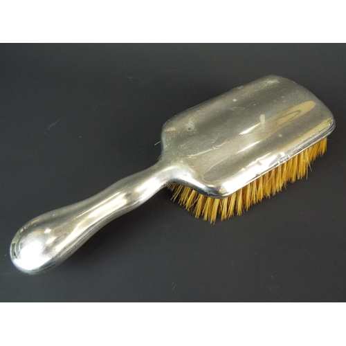 70 - Silver backed hair brush with Chester hallmark.