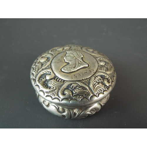 75 - Victorian Silver pill box depicting embossed image of the Queen.