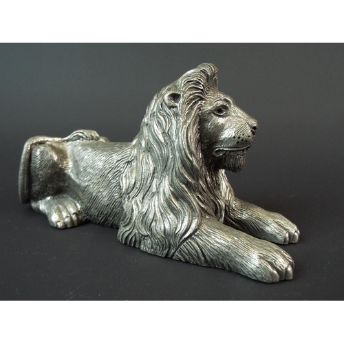 8 - Royal Selanoor pewter recumbent lion, 7.5 inches long.