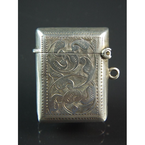 81 - Beautifully scrolled Hallmarked silver vesta. William Hutton and son.