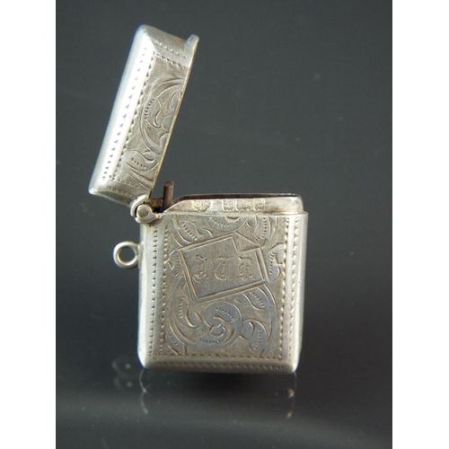 81 - Beautifully scrolled Hallmarked silver vesta. William Hutton and son.