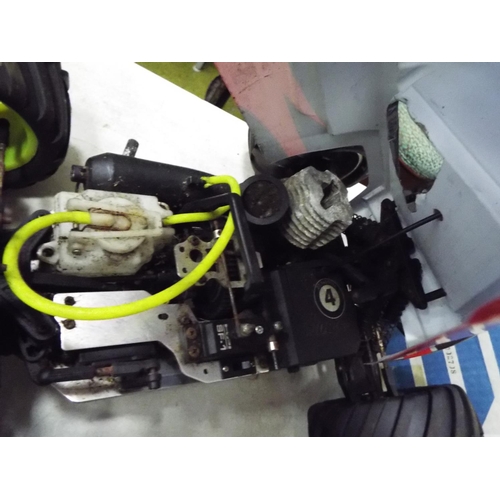 16 - Radio controlled model fuel engined buggy model 16 inches long. Working condition unknown.