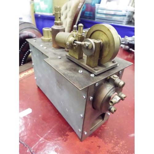 29 - Steam engine in metal cradle. Working condition unknown.