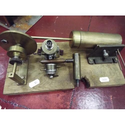 31 - Components from steam engine mounted on wooden base