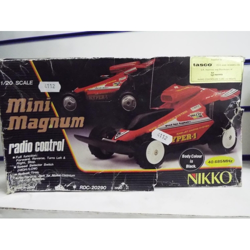 42 - 1:20 Scale R/C mini Magnum in original but tatty box