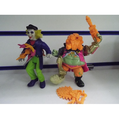 53 - Beetlejuice platic figure plus one other hideous space creature.