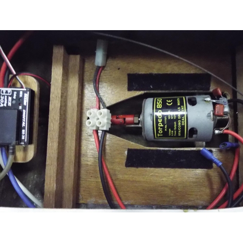 8 - Racing Model power boat with Torpedo 850 electric motor 32 inches long. Working condition unknown.