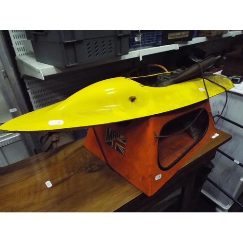 9 - model fuel Engine powerboat 32 inches long with carry cradle. Working condition unknown.