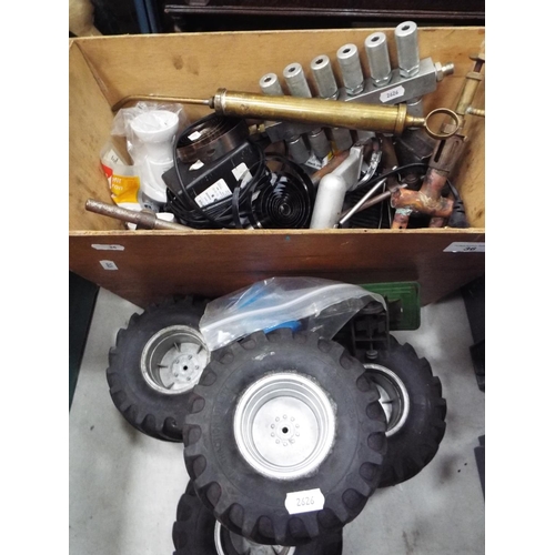 36 - Box of assorted model making equipment to include engines, wheels etc