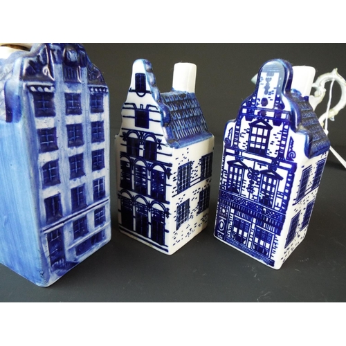 14 - Pair of ceramic Dutch Delft condiments with a complimentary oil bottle. All as Dutch town houses, to... 