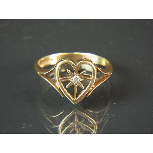 60 - 9ct Yellow gold heart shaped ring set with a single central Diamond.  Finger size 'S-5'   3.0g