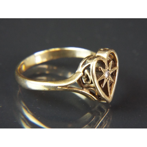 60 - 9ct Yellow gold heart shaped ring set with a single central Diamond.  Finger size 'S-5'   3.0g