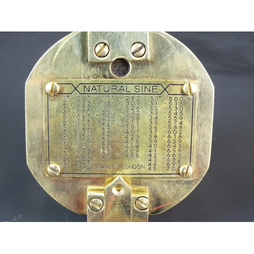 110 - Brass marching compass with spirit leveler to base by Stanley of London.