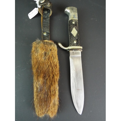 114 - 1950's German Scout knife with Solingen blade. Fur covered metal scabbard.