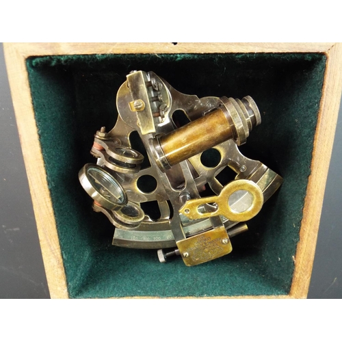 129 - Reproduction brass sextant in purpose built wooden box. Stamped Kelvin & Hughes 1917