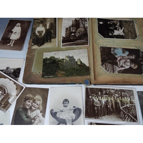 148 - 60+ Vintage Social History postcards together with a vintage album.