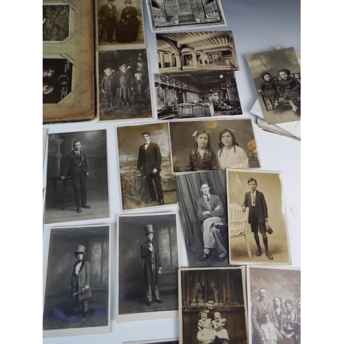 148 - 60+ Vintage Social History postcards together with a vintage album.