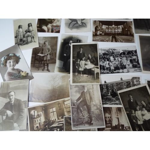 148 - 60+ Vintage Social History postcards together with a vintage album.