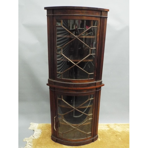 181 - Pair of Mahogany bow fronted wall corner cabinets with glazed panel doors. Each 34 inches tall 20 in... 