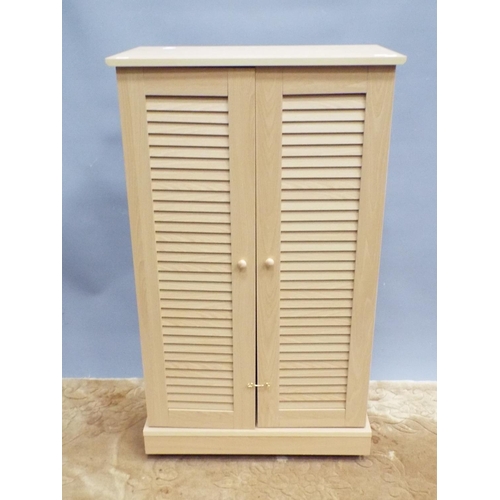 185 - Handy Space saving shoe cupboard with louvre front doors. H:41 X W:24 X D:13 inches. Raised on casto... 