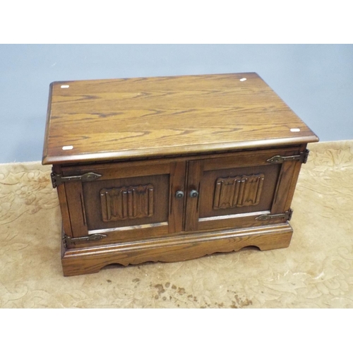 208 - Old charm style oak low cupboard. H:18 x W:30 X D:19 inches.