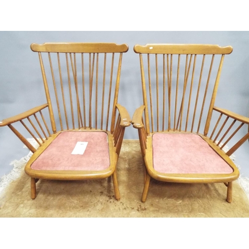 216 - Pair of beautifully made stick back Ercol Chairs in the 19140 pattern. With fitted upholstered cushi... 