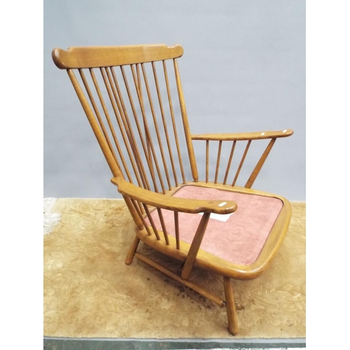 216 - Pair of beautifully made stick back Ercol Chairs in the 19140 pattern. With fitted upholstered cushi... 