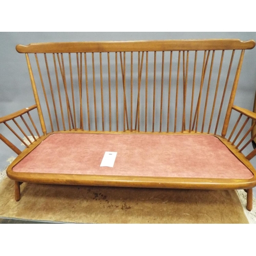 217 - Beautifully made stick back Ercol three seater settee in the 19140 pattern with fitted upholstered c... 