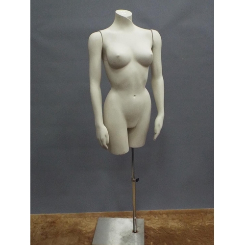 220 - Lifesize female shop torso on adjustable stainless steel support.