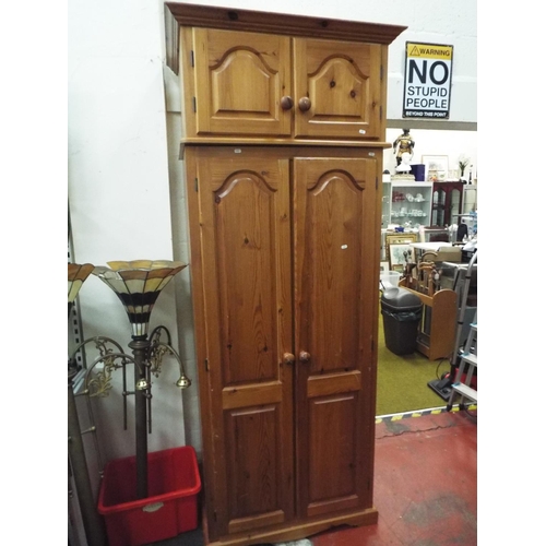 229 - Large pine wardrobe with cupboard over. 7ft 4 inches.