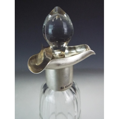 273 - Cut glass oil decanter with silver tri pourer neck. Hallmarked Chester 1906, Robert Pringle.