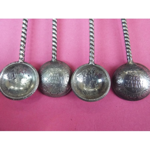 283 - Four hand made silver spoons crafted from silver quarter Rupee's and having fox or elephants to Hand... 