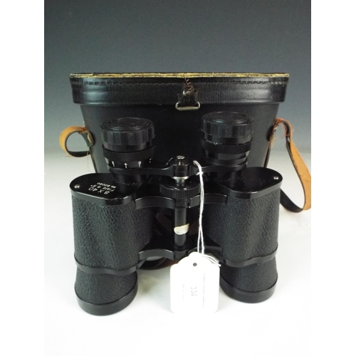 336 - Pair of 8 x 40 binoculars with hard leather case.